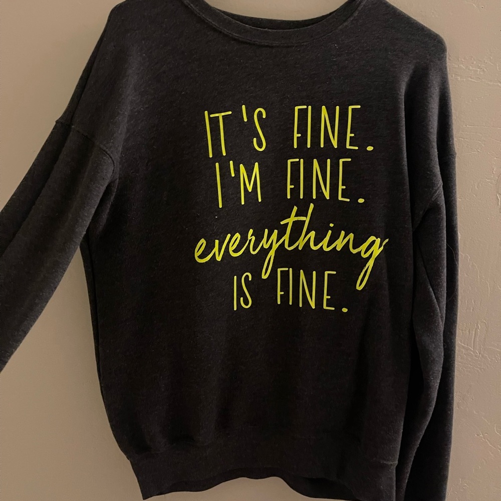 It’s fine. I’m fine. Everything is fine.  Woman’s medium sweater